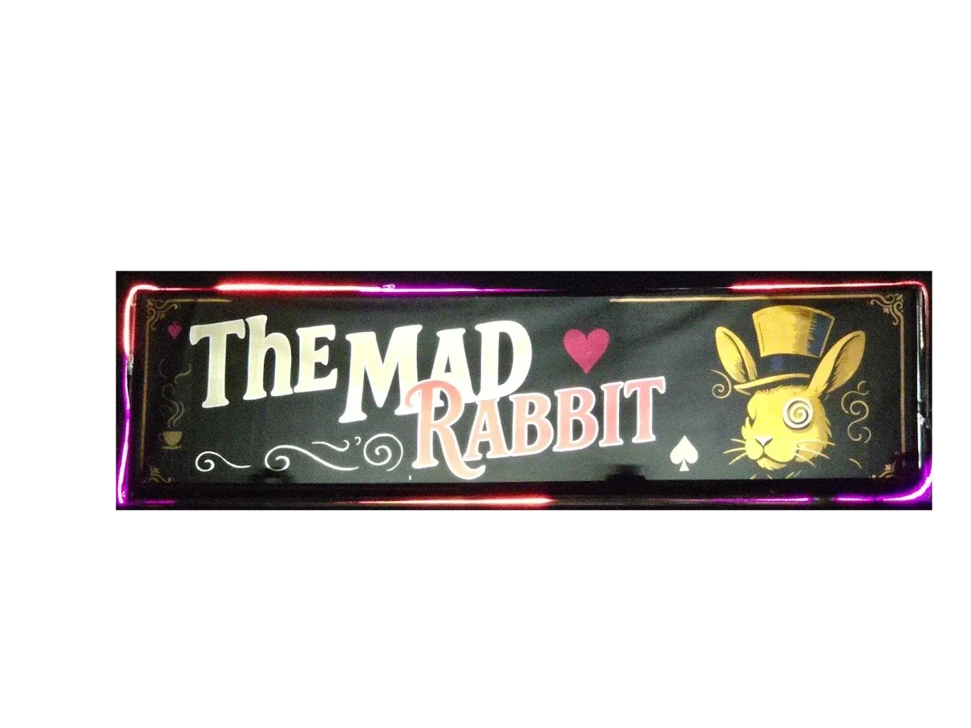 The Mad Rabbit’s illuminated sign with a rabbit in a top hat